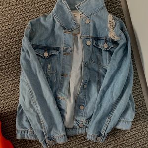 Distressed jean jacket